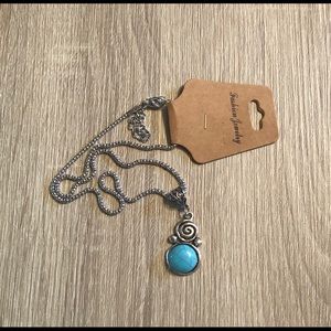 Silver spiral necklace with turquoise stone